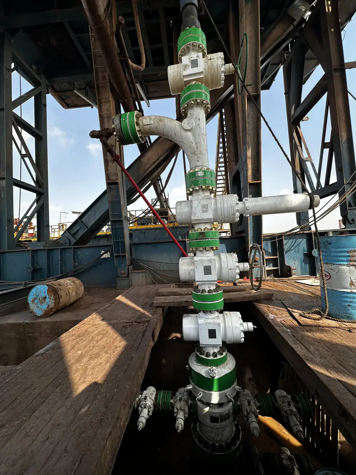 Installed Christmas Tree assembly beside a rig